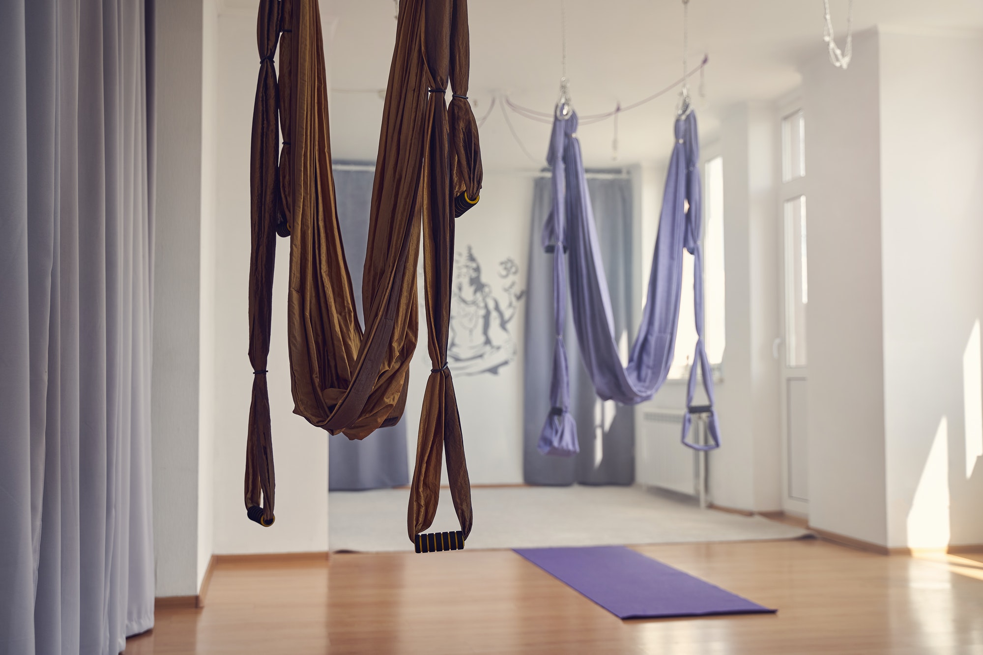 Yoga hammock swings handing in yoga studio